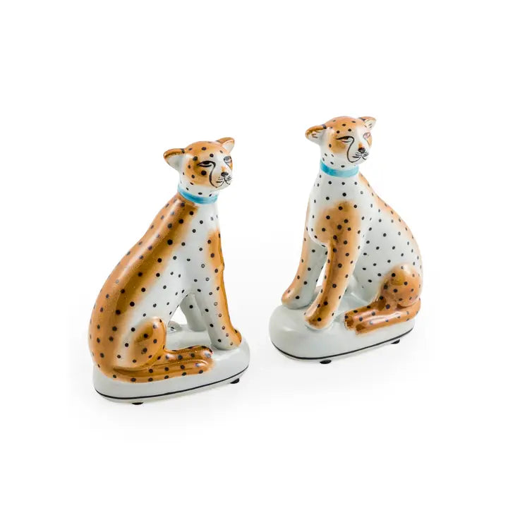 Pair of ceramic sitting leopards