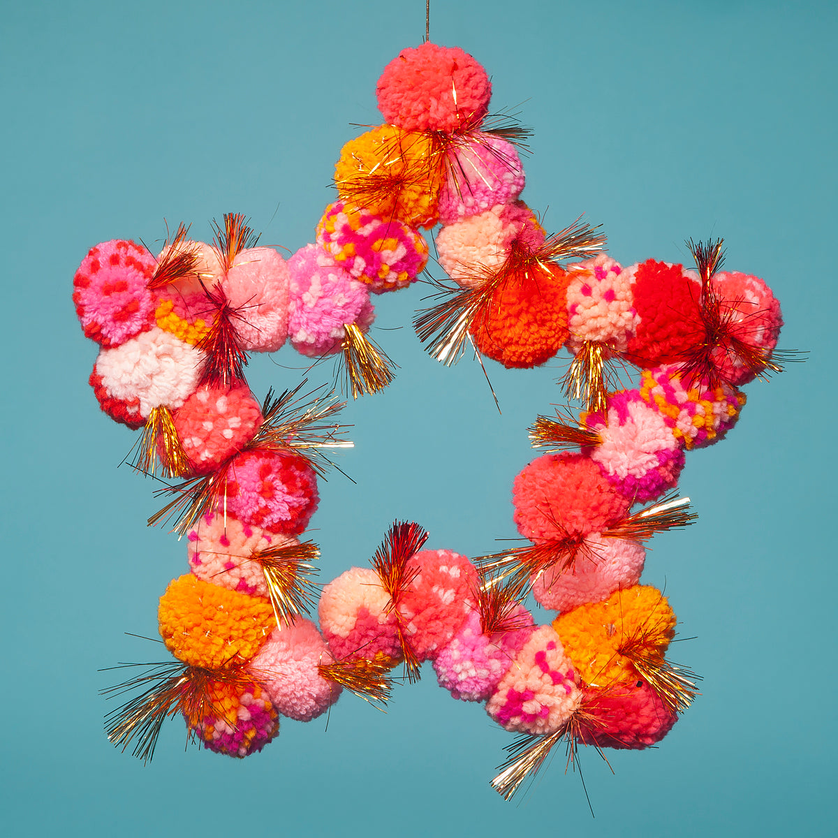 Pom Pom star hanging orange / pink-Little Fish Co.
