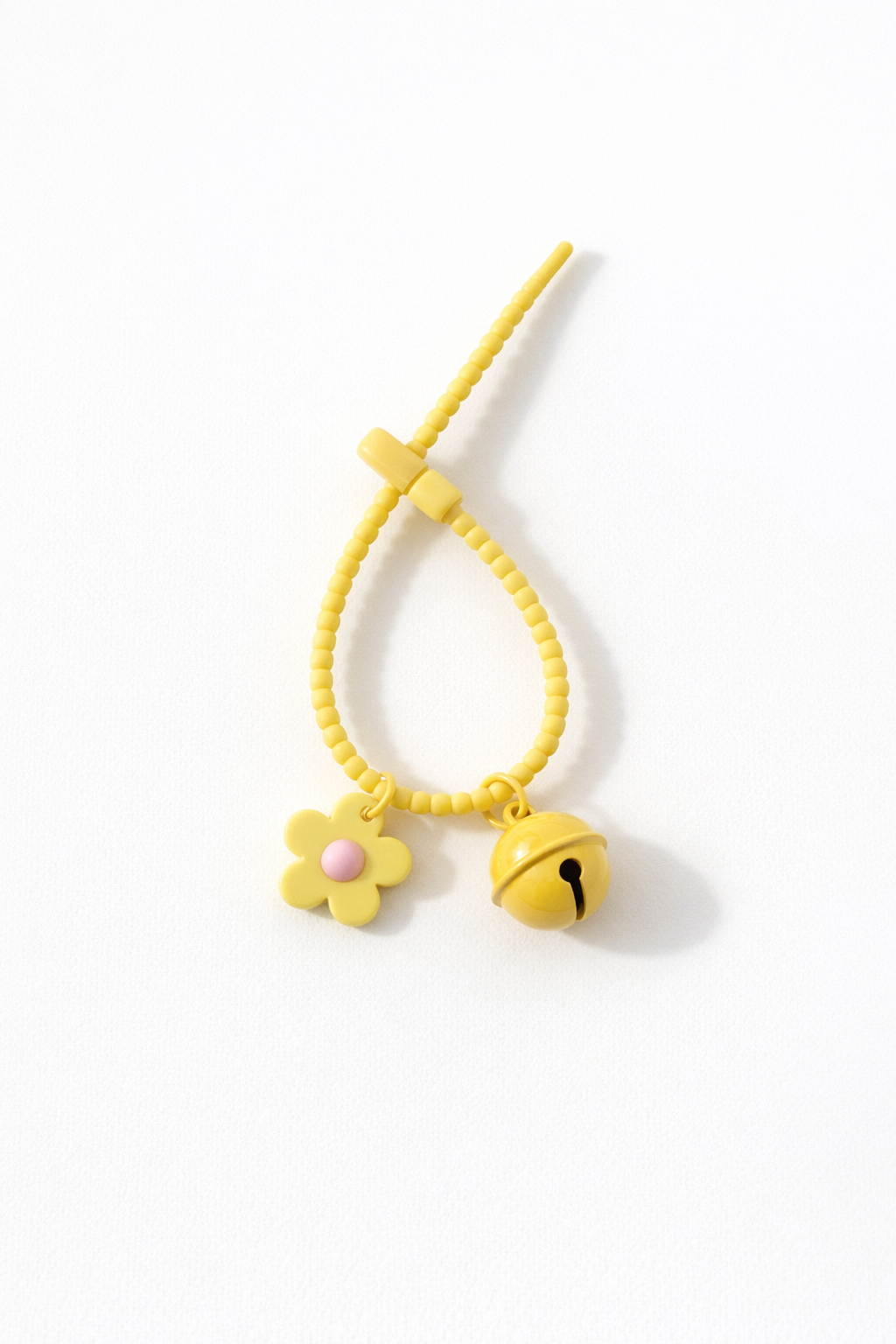 Floral silicon grip tie key chain with bell - colours assorted