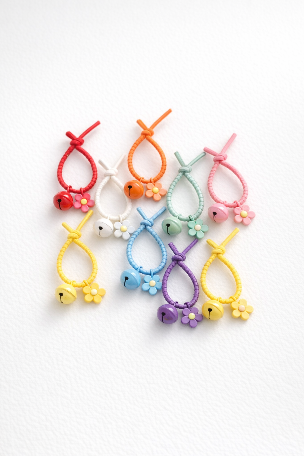 Floral silicon grip tie key chain with bell - colours assorted