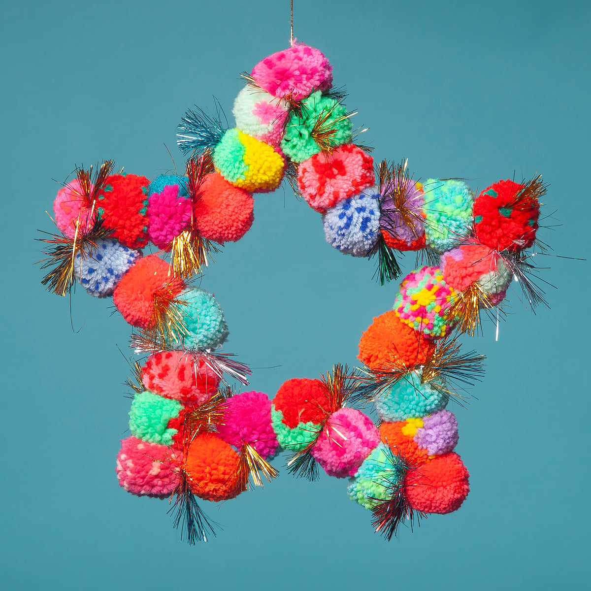 Pom Pom star hanging multi-Little Fish Co.