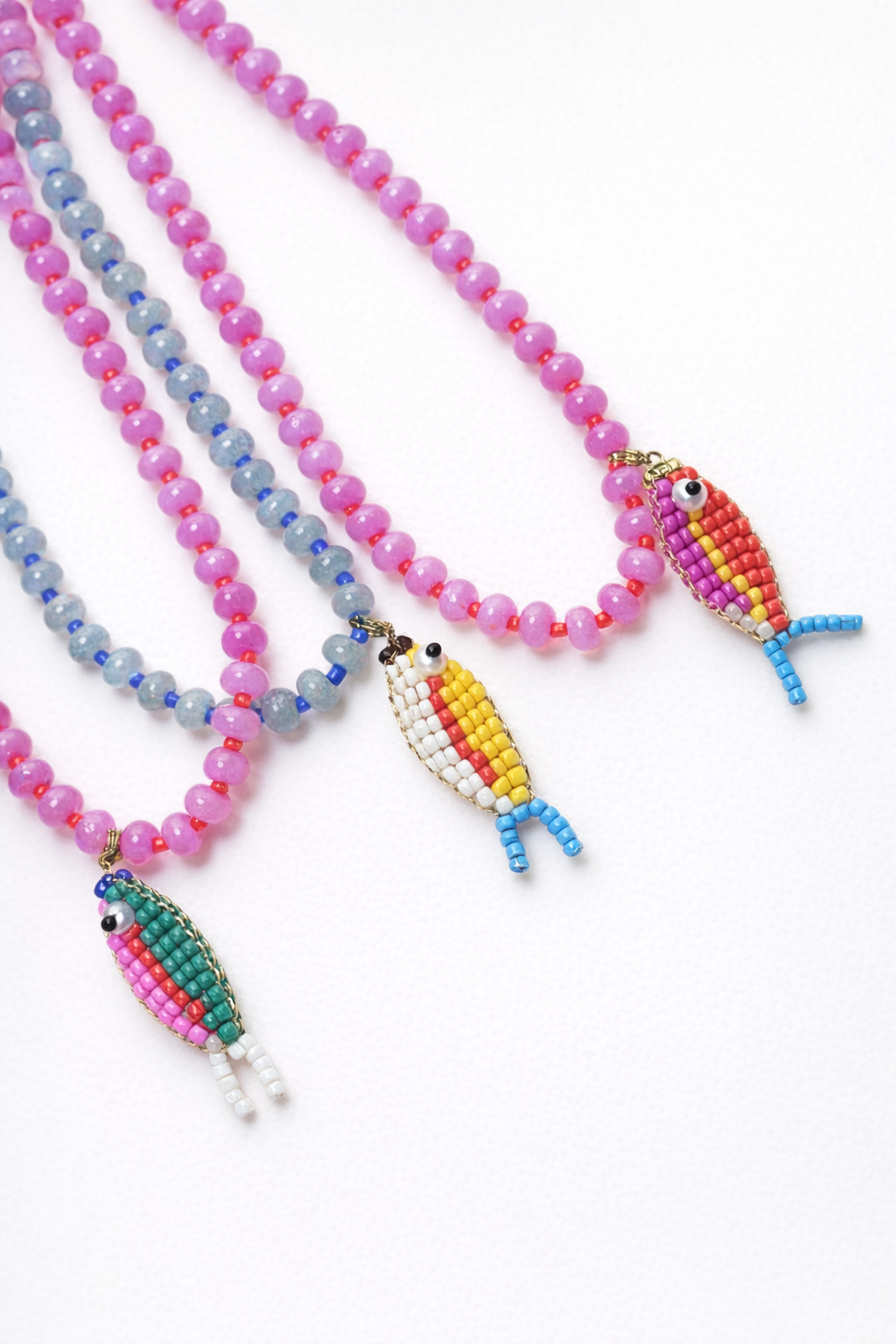 Stone necklace with fish pendant