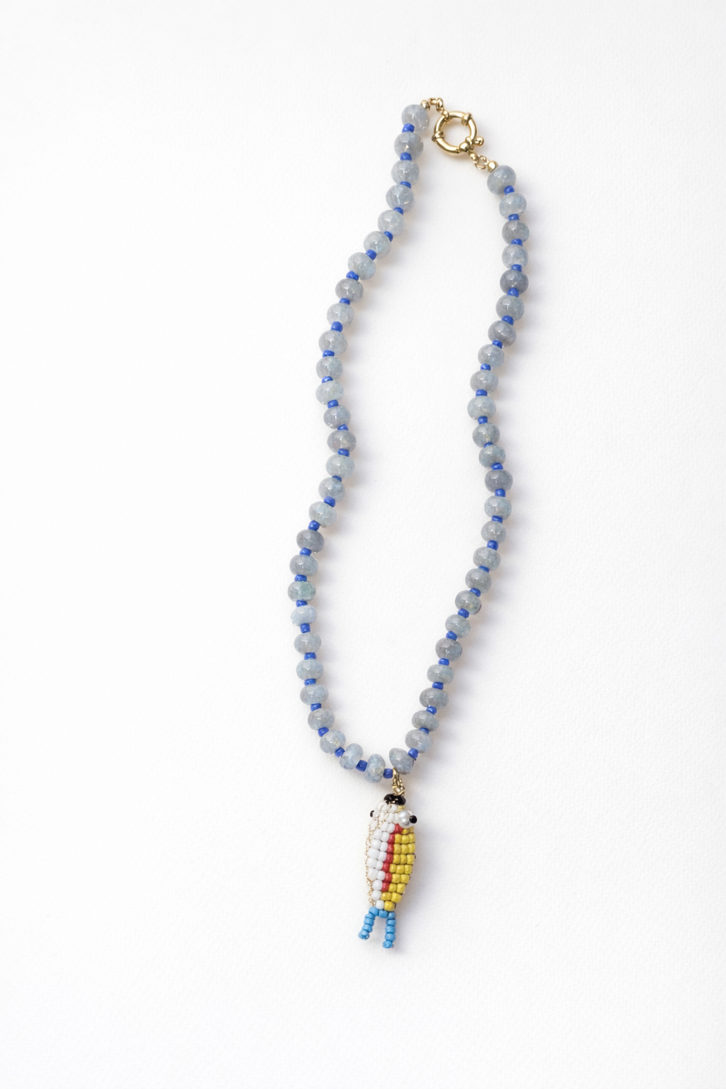 Stone necklace with fish pendant