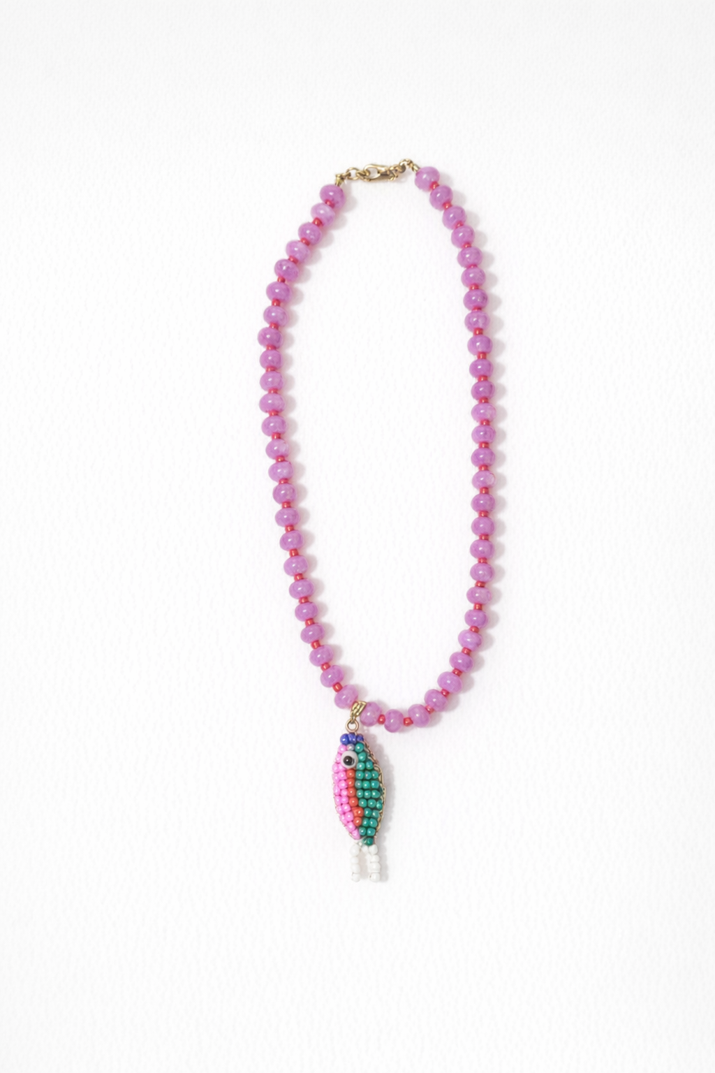 Stone necklace with fish pendant