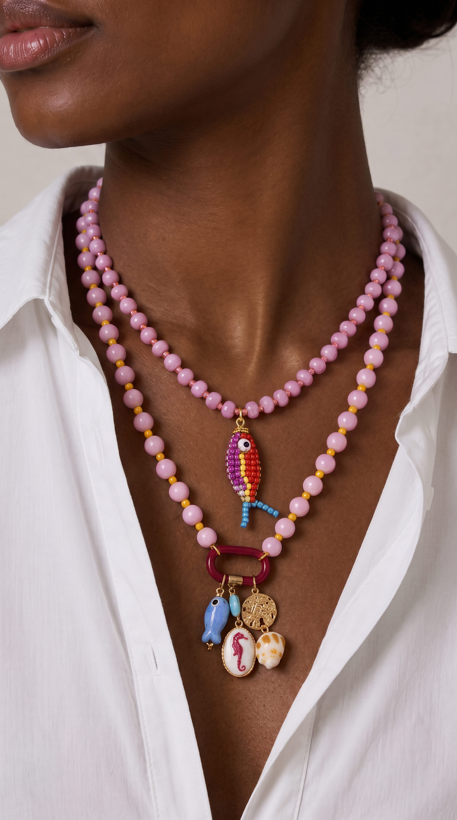 Stone necklace with fish pendant