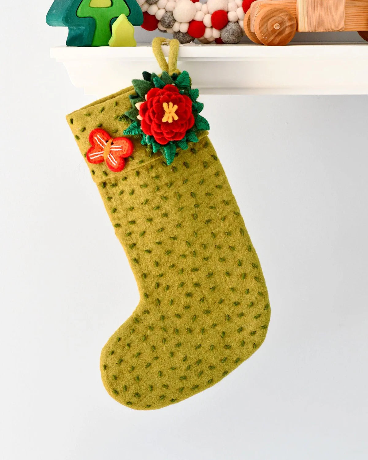 felt Christmas stocking green with flower